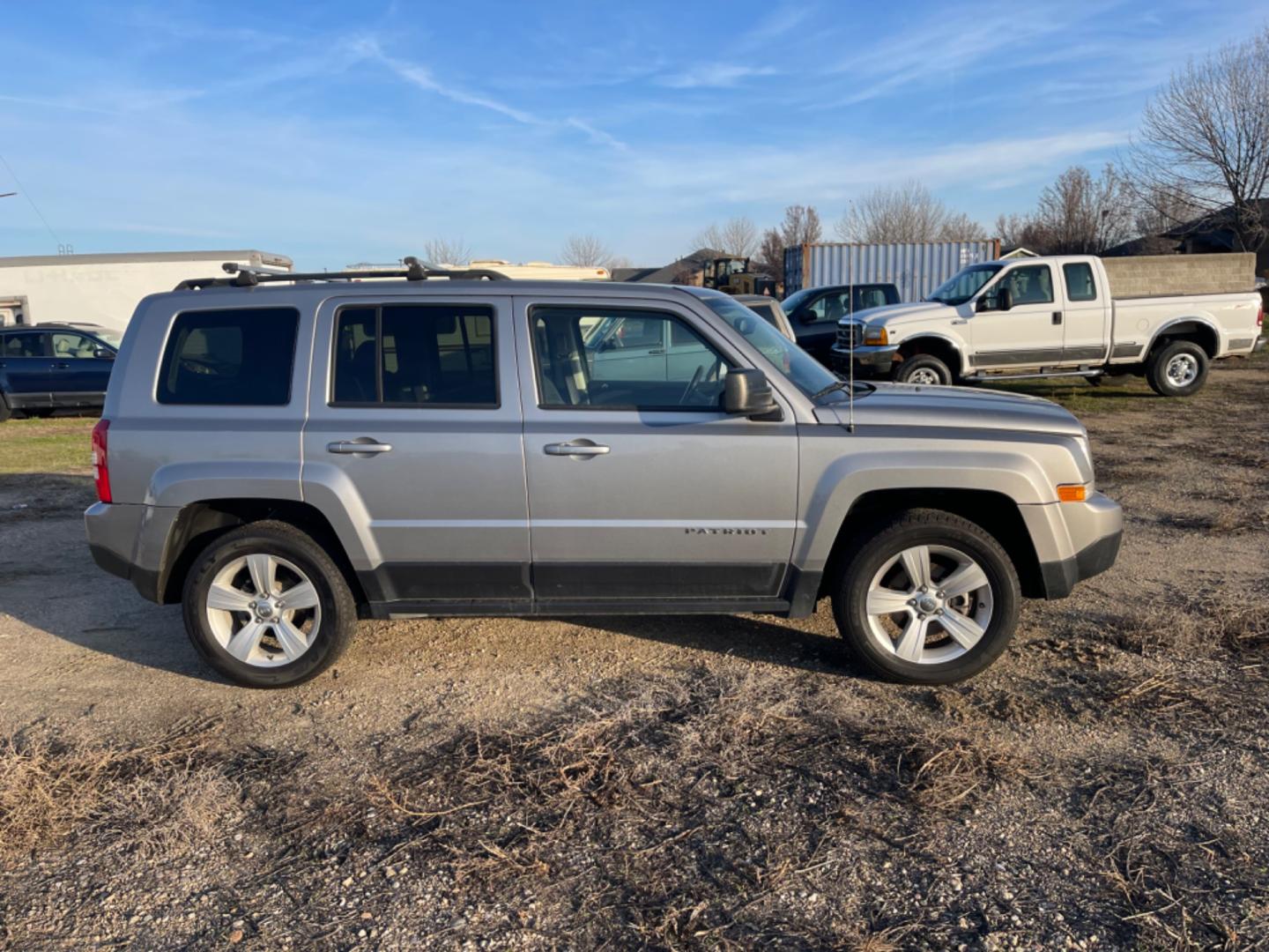 2017 Silver /Black Jeep Patriot Latitude (1C4NJRFBXHD) with an 2.4L L4 DOHC 16V engine, AT transmission, located at 813 E Fairview Ave, Meridian , ID, 83642, (208) 336-8230, 43.618851, -116.384010 - Photo#4